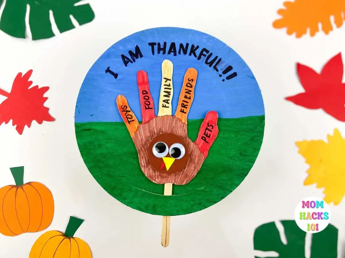 Thankful Turkey Handprint Paper Plate Craft - Mom Hacks 101 inside Turkey Hands Printable Informational